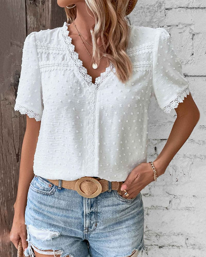 Witte Kanten Top Met V Hals En Subtiele Stipjes Voor Dames