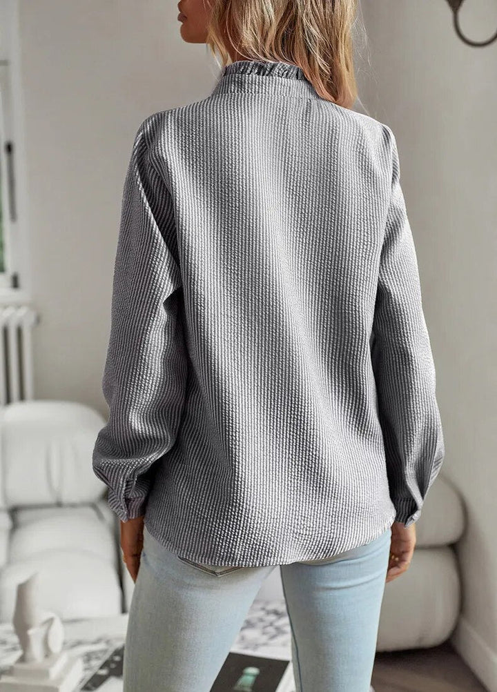 Jamie - Blouse met ruffles en opstaande kraag