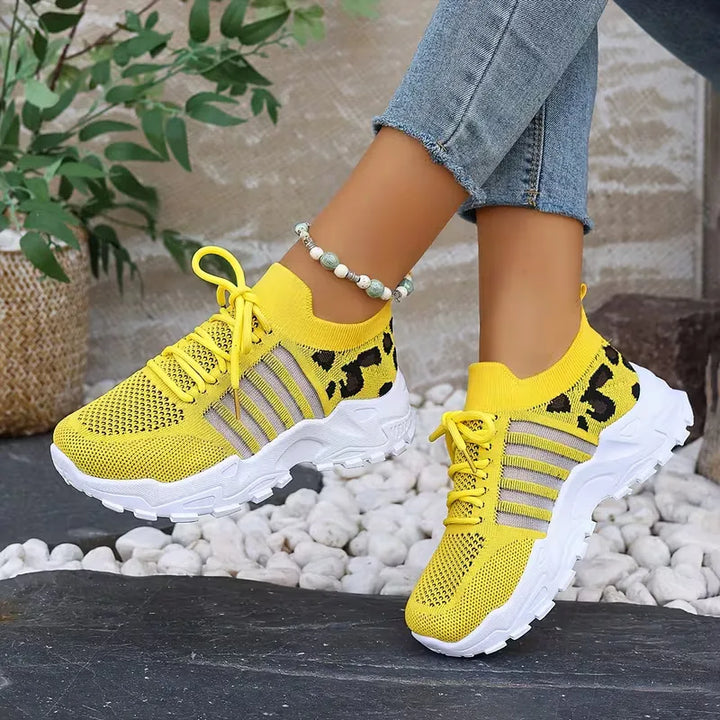 Lage sneaker met leopard print