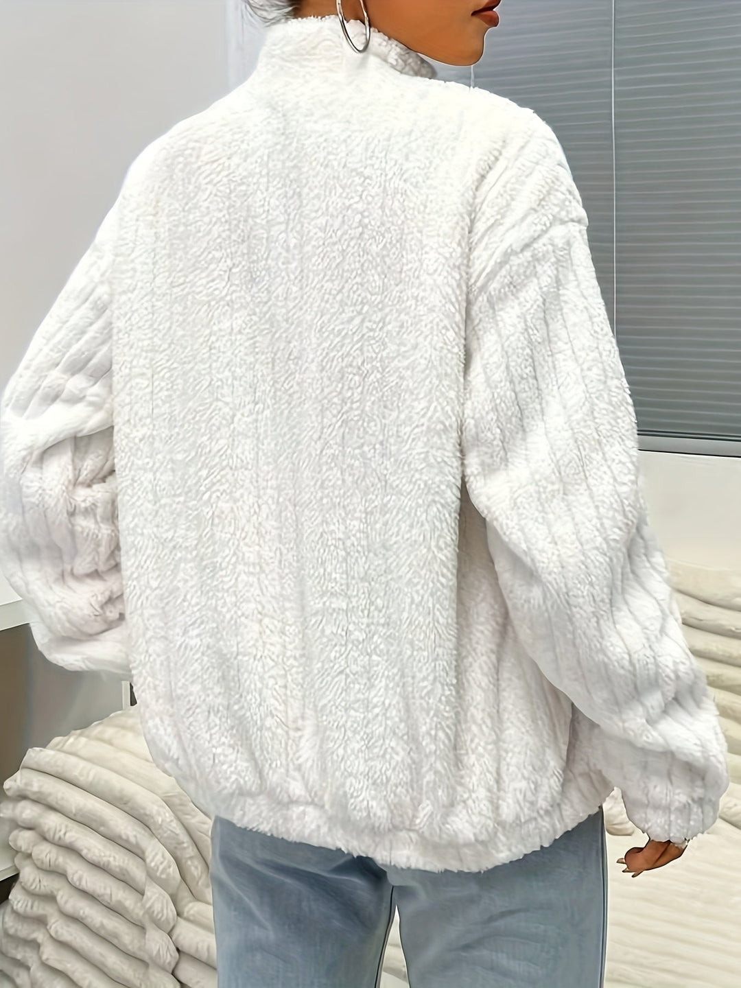 Nina | Rits teddy jas met ribbels en lange mouwen