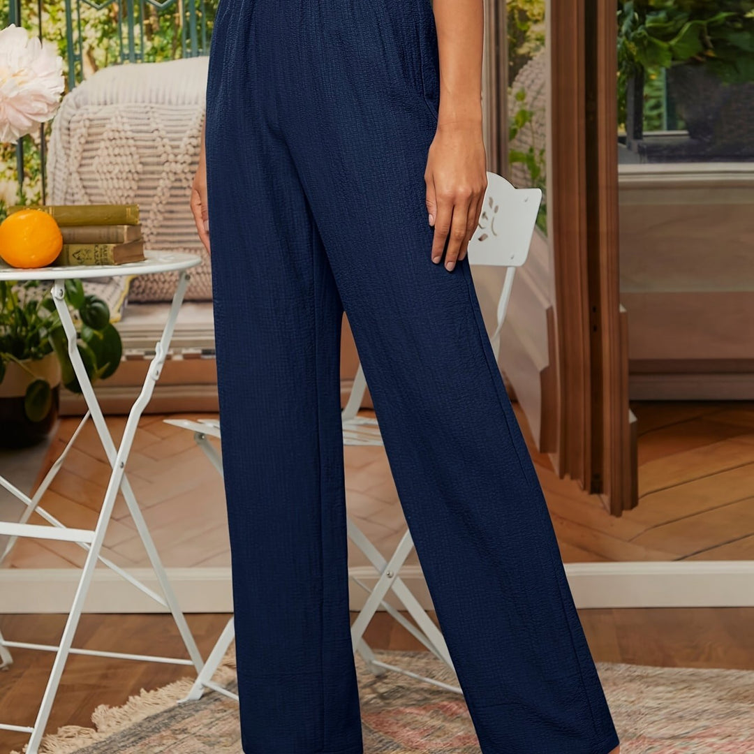 Noa | Effen getextureerde broek met rechte pijpen en elastische taille