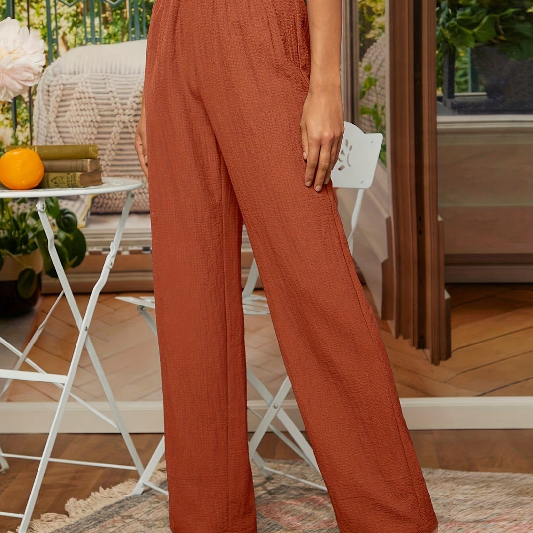 Noa | Effen getextureerde broek met rechte pijpen en elastische taille